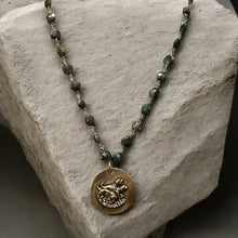 Load image into Gallery viewer, Necklace, Antique Hunt Designs, Cast Bronze Medallion, “Pharaoh’s Horses”, on Raw Emerald Chain, 18”