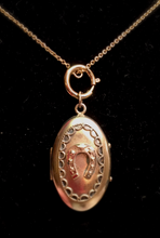 Load image into Gallery viewer, Locket, Antique Gold plated locket w 9kt gold horse shoe on front