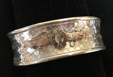 Load image into Gallery viewer, Bracelet, AH designed, late 1800’s 9 kt rose gold brooch mounted on vintage woven sterling cuff