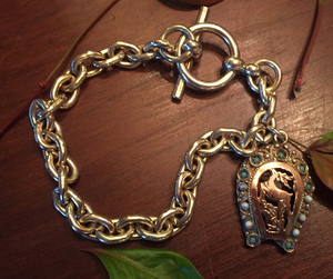 Bracelet, AH designed 19th c 9 kt gold stag charm bracelet