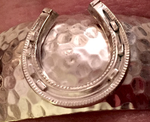 Bracelet, AH designed, features a  Victorian-Edwardian Sterling Horse Shoe Brooch on a Modern, Hammered Sterling Cuff