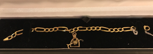 Bracelet, 9 kt with 15 kt gold fox-whip-stirrup charm
