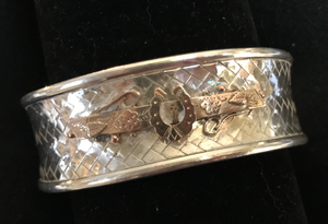 Bracelet, AH designed, late 1800’s 9 kt rose gold brooch mounted on vintage woven sterling cuff