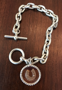 Bracelet, AH Designed, 19th c rose gold horse shoe on sterling disc & modern toggle chain